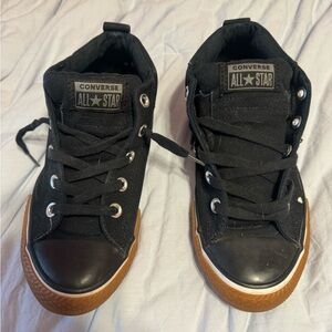 Converse Kids Chuck Taylor all star street mid black with gum soles.